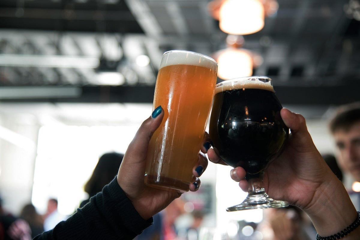 People toasting with craft beers