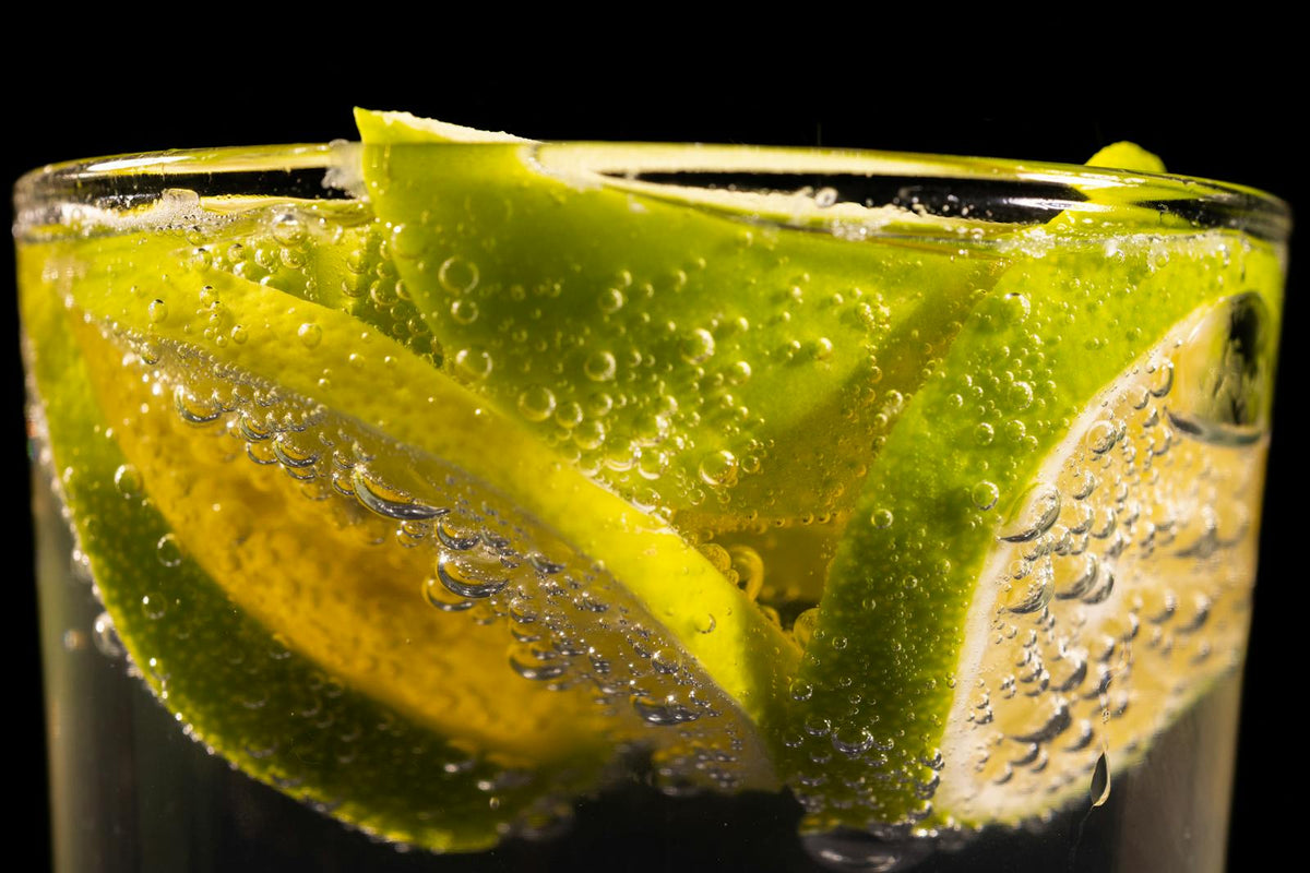 Lime slices in fizzy sparkling water