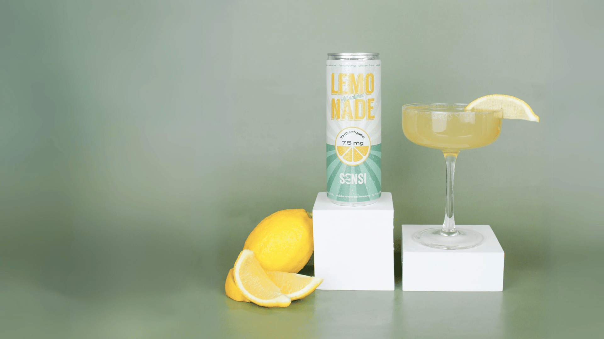 lemonade can with lemonade cocktail and lemon slices