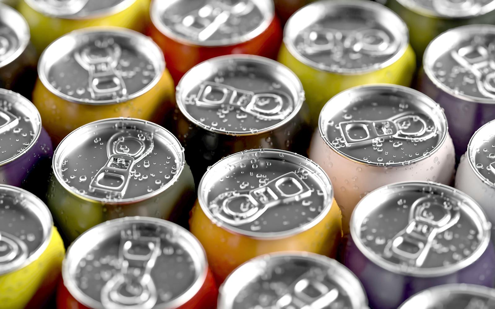 Colorful soda cans with condensation beads