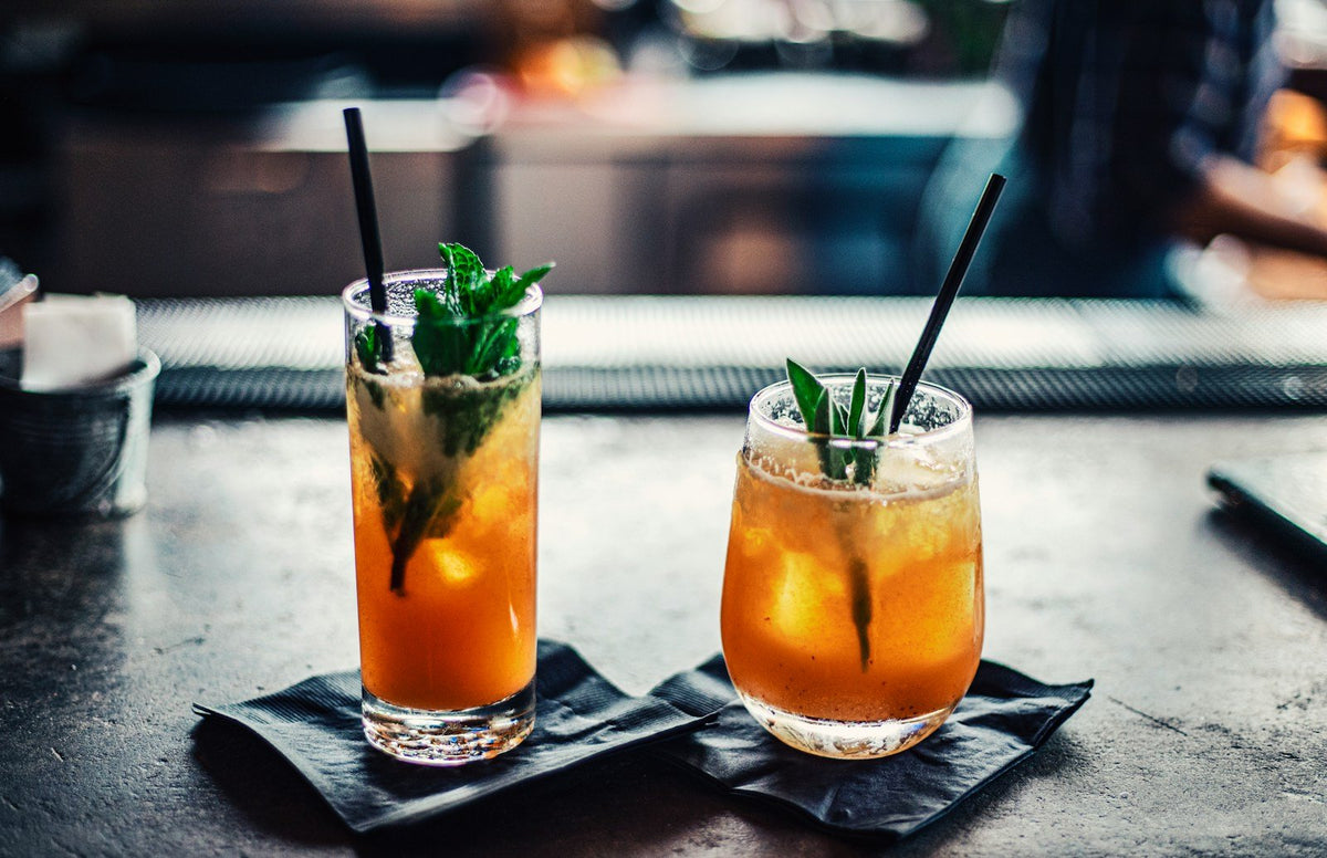 Refreshing cocktails with mint garnish