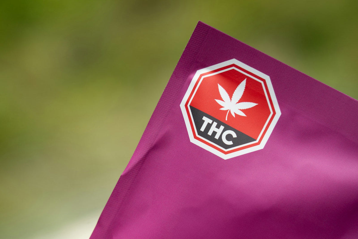 THC warning label on purple packaging