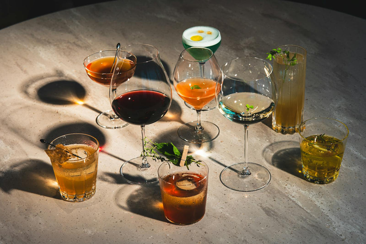 Assorted cocktails and wines on a table