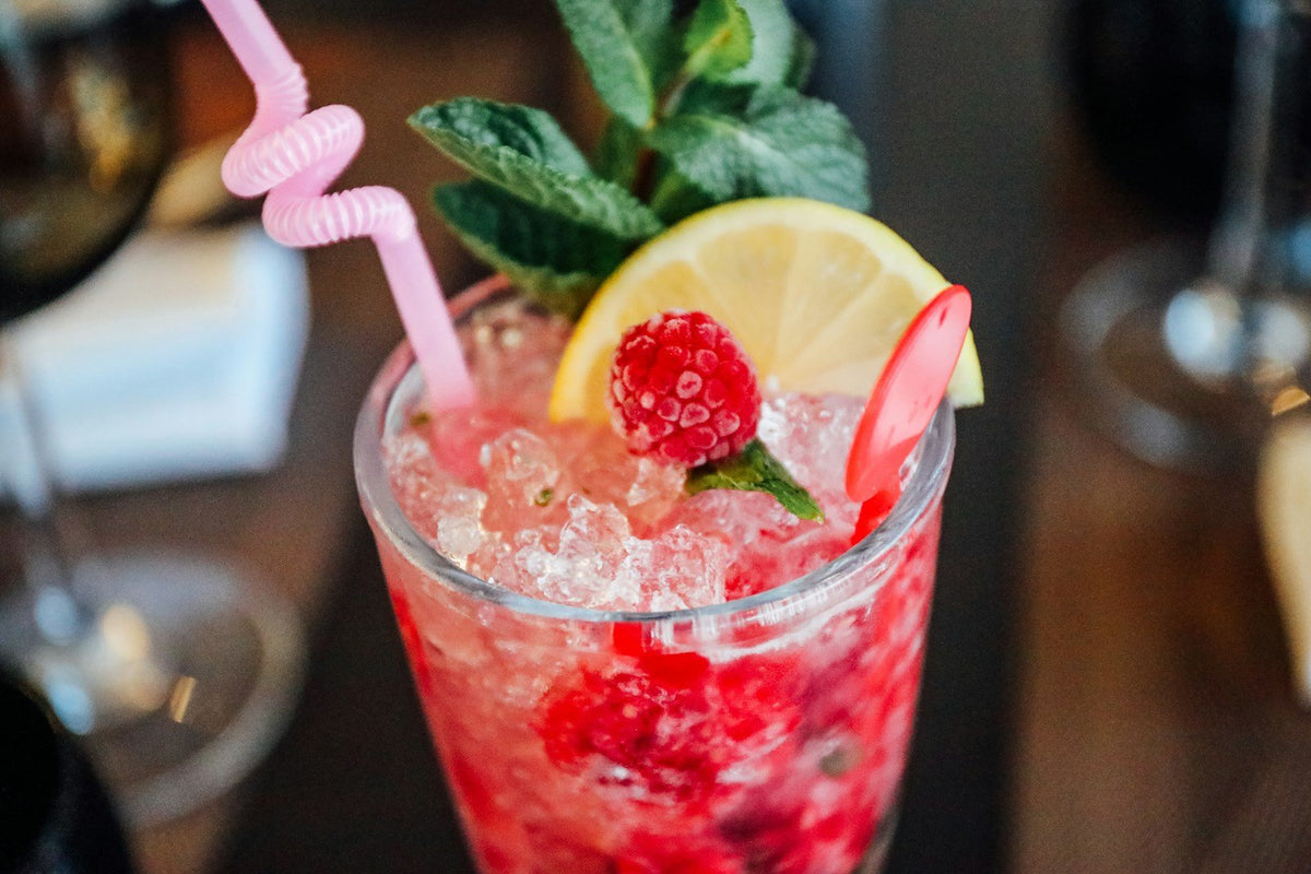 Refreshing raspberry lemonade with mint garnish