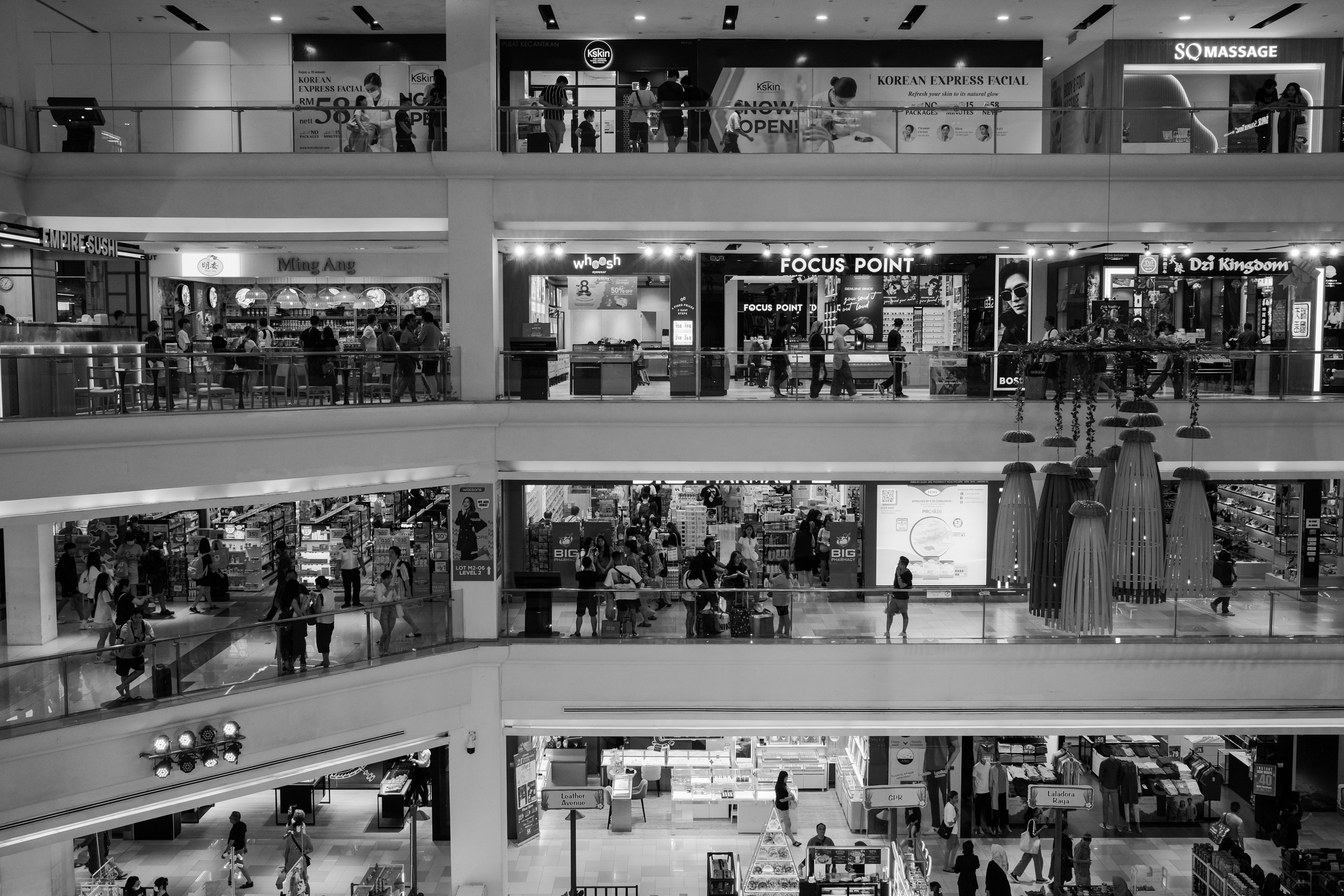 Busy multi-level shopping mall interior view