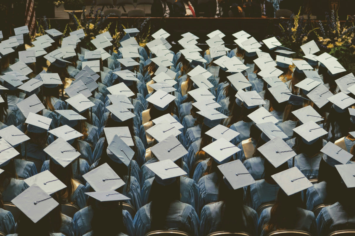 Graduation hats in rows