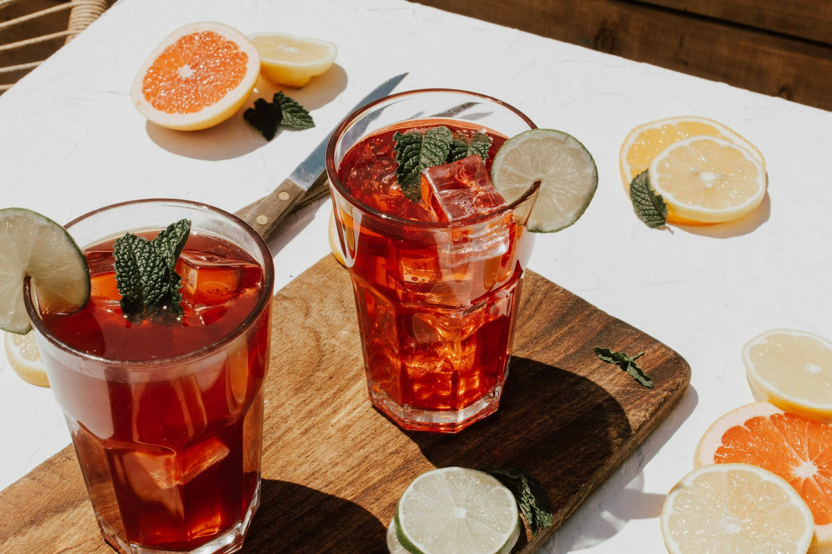 Iced tea with citrus and mint garnish