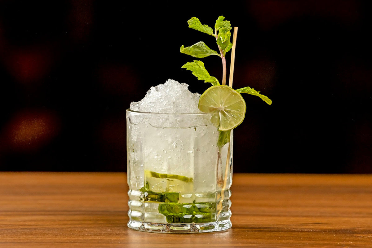 Refreshing mojito cocktail with lime garnish